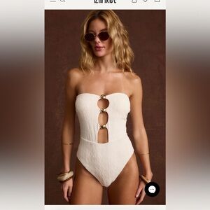 Elegant White Strapless Swimsuit with Gold Accents from 12th tribe
